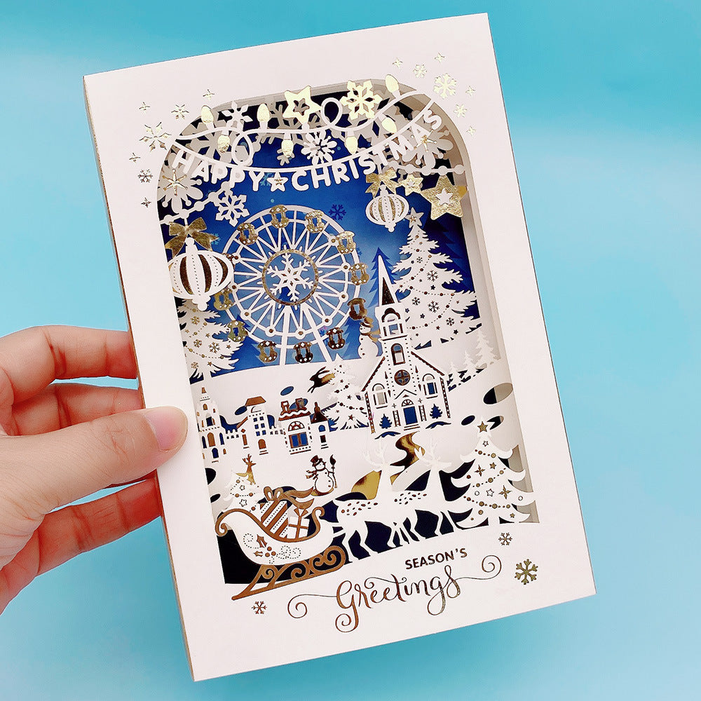 Ferris wheel winter town laser cut 3D layered Christmas pop up holiday card