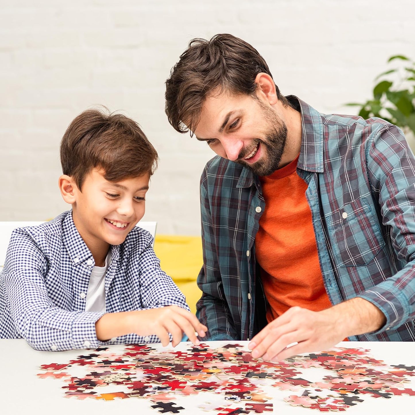 Family bonding time assembling custom personalized photo puzzle together at home, parent child interactive leisure activity sentimental custom picture jigsaw puzzle