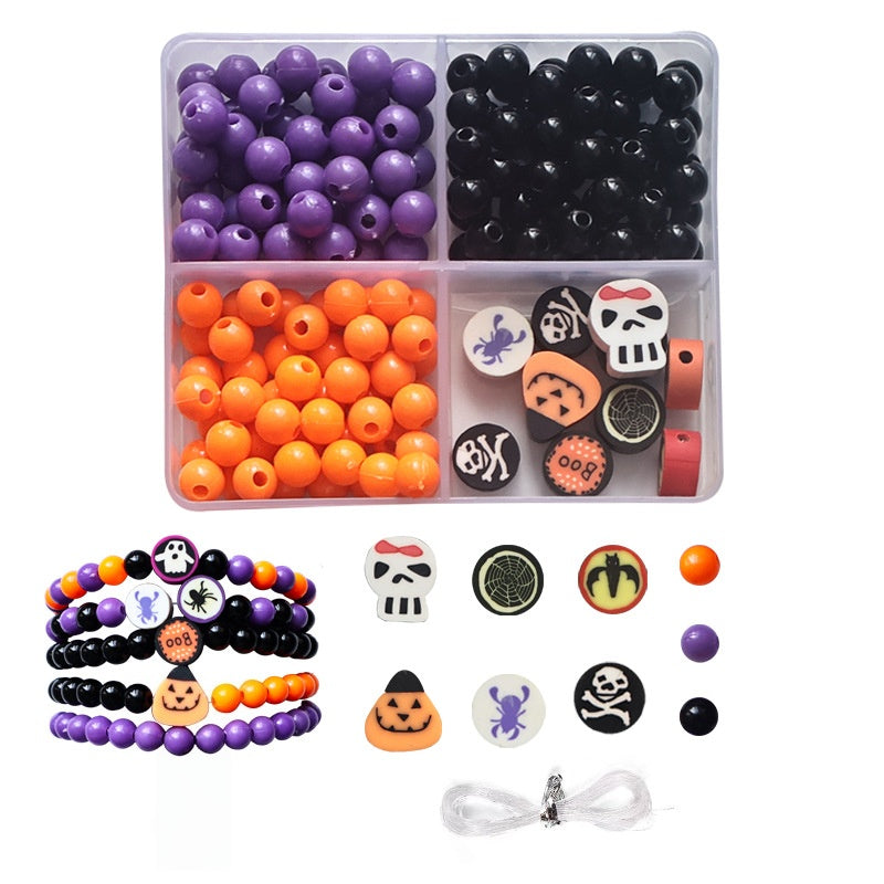 Halloween DIY bracelet making kit with purple orange black resin beads and pumpkin skull charms