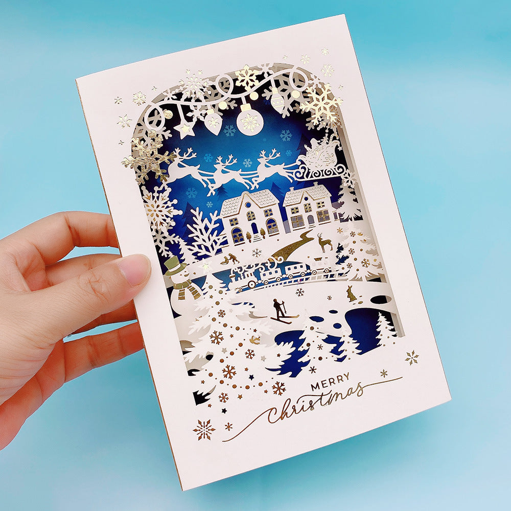 Blue snowy landscape layered paper craft Christmas pop up greeting card