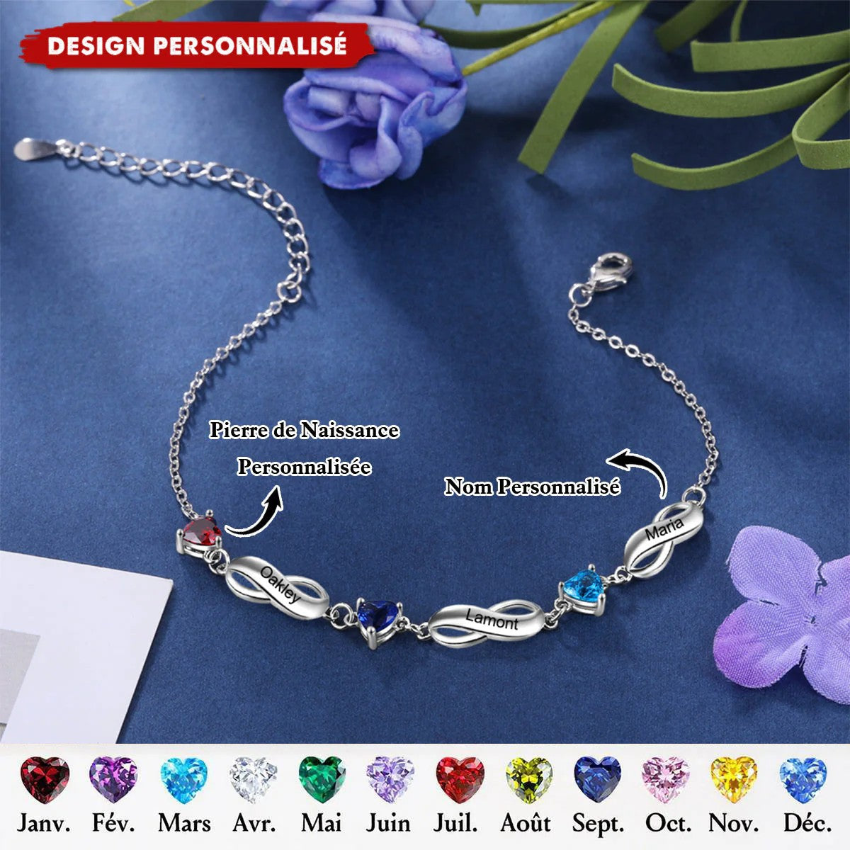 Brass engraved infinity bracelet with colorful heart zircon placed on dark fabric with purple flower decoration