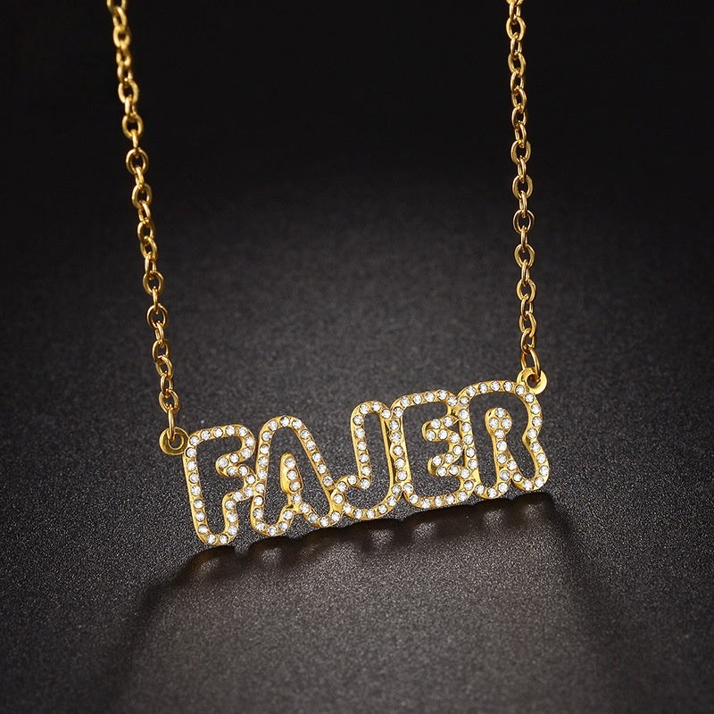 Gold stainless steel bubble word pendant with zircon border displayed on gradient black background