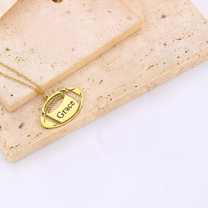 Close-up of Custom Rugby Pendant Necklace with Engraved Name, Gold Stainless Steel