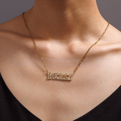 18K gold custom cubic zirconia hollow block letter name necklace worn by woman, personalized shiny nameplate statement jewelry for women