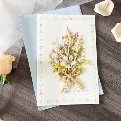 Dried flower greeting card with light blue envelope