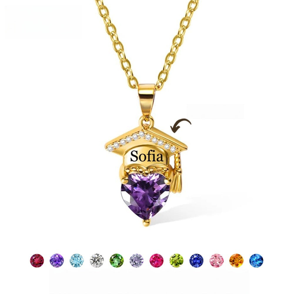Gold plated brass graduation cap pendant with purple heart zircon matched with full birthstone color