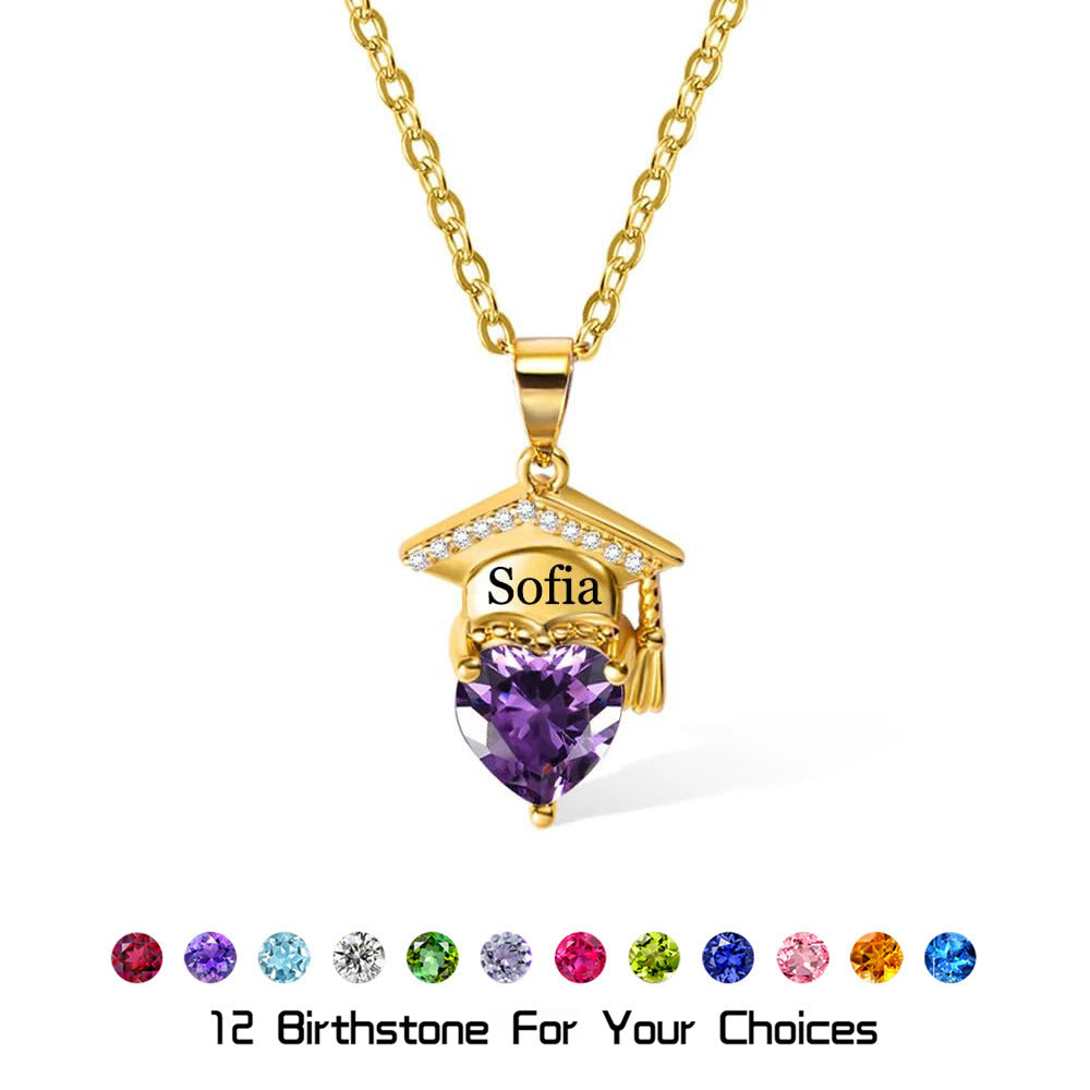 Studio white background photo of gold brass engraved graduation necklace with purple heart cubic zirconia