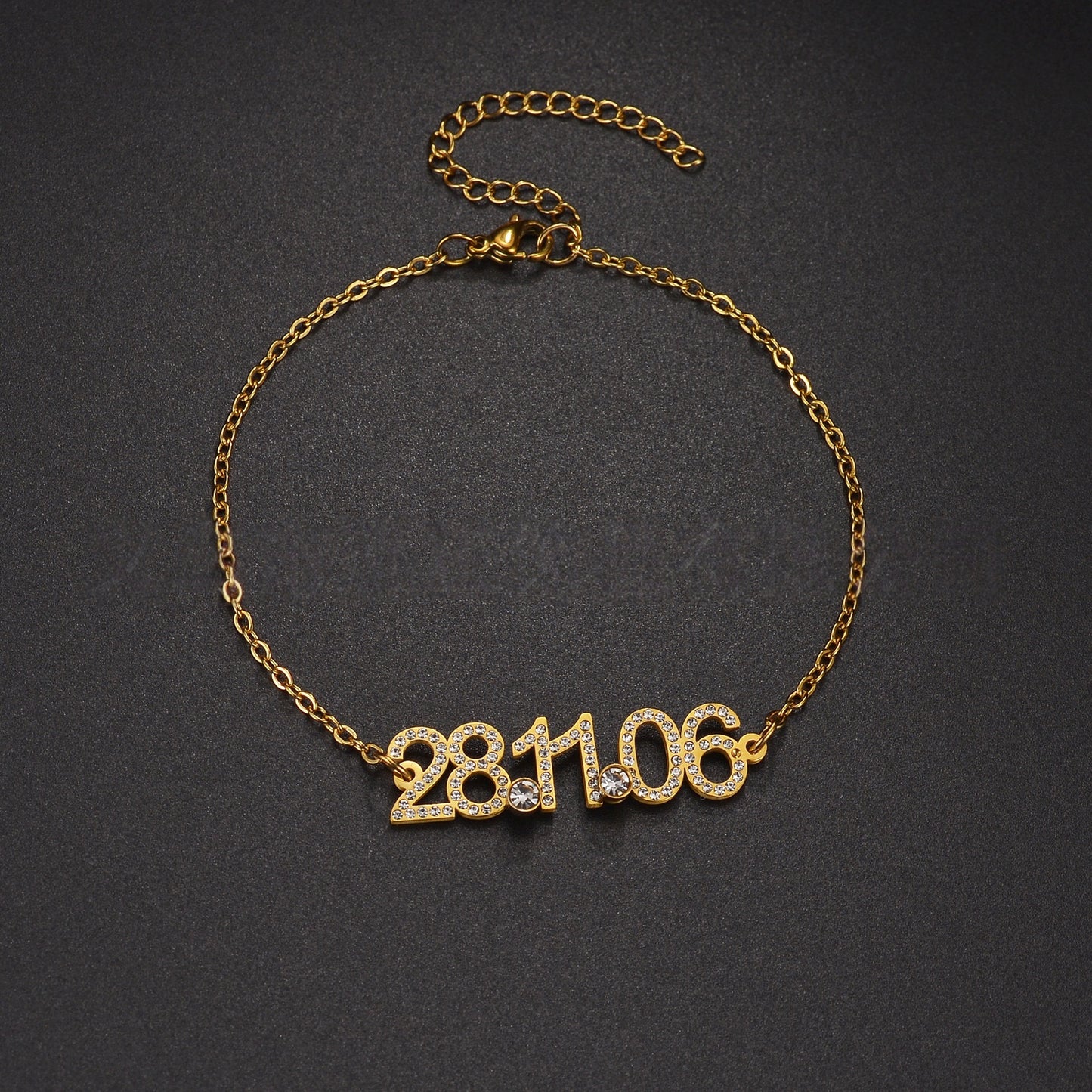Close-up of gold personalized engraved special date number necklace, minimalist milestone memory jewelry for daily wear