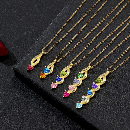 Gold Plated Assorted Multi Heart Twisted Birthstone Necklaces Flat Lay Display Custom 1-6 Birthstone Family Jewelry
