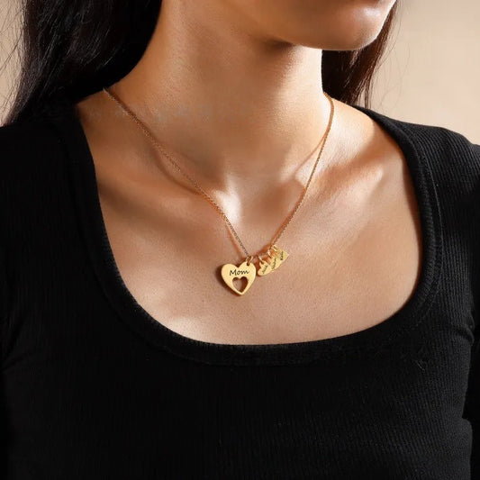 Dainty gold personalized multi heart name necklace worn by lady, custom engraved family kids name hollow heart pendant jewelry