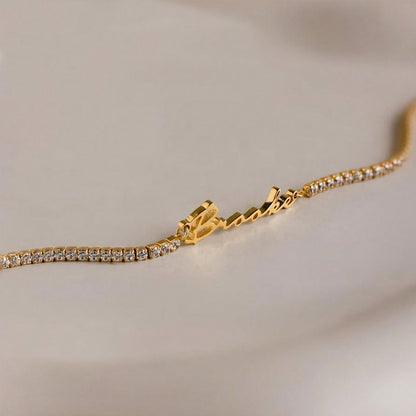 gold stainless steel custom name zircon tennis bracelet with extender chain closeup