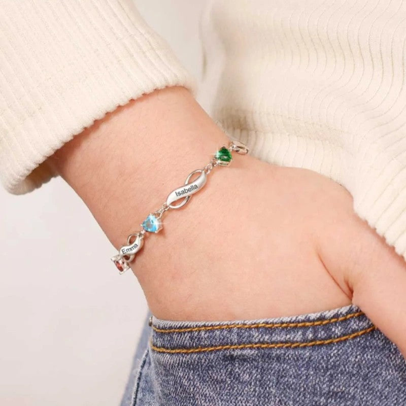 Actual wearing effect of brass heart birthstone infinity bracelet on wrist with daily casual outfit
