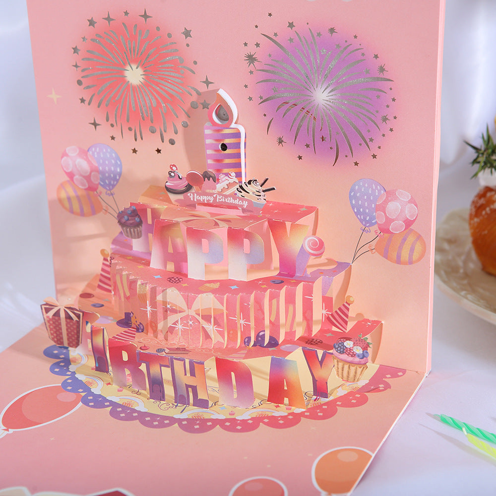 Pink birthday cake pop up card, illuminated 3D popup birthday greeting card