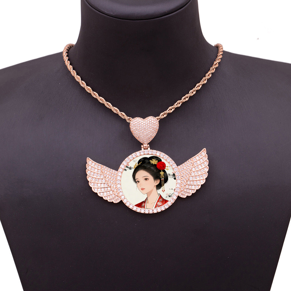 Lifestyle mannequin shot of rose gold angel wing personalized photo necklace, unisex wearable memory jewelry