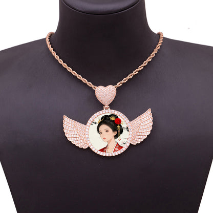 Lifestyle mannequin shot of rose gold angel wing personalized photo necklace, unisex wearable memory jewelry