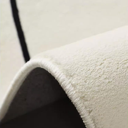 Close-up of dotted plastic non-slip backing for faux cashmere decorative floor rug