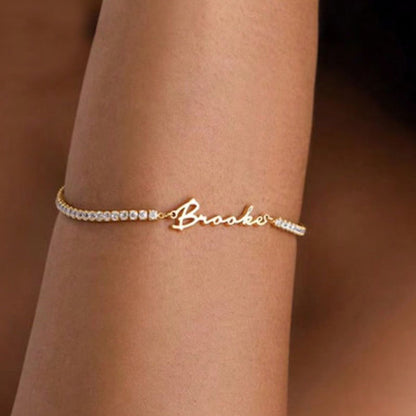 Dainty silver custom name zircon tennis bracelet worn on wrist