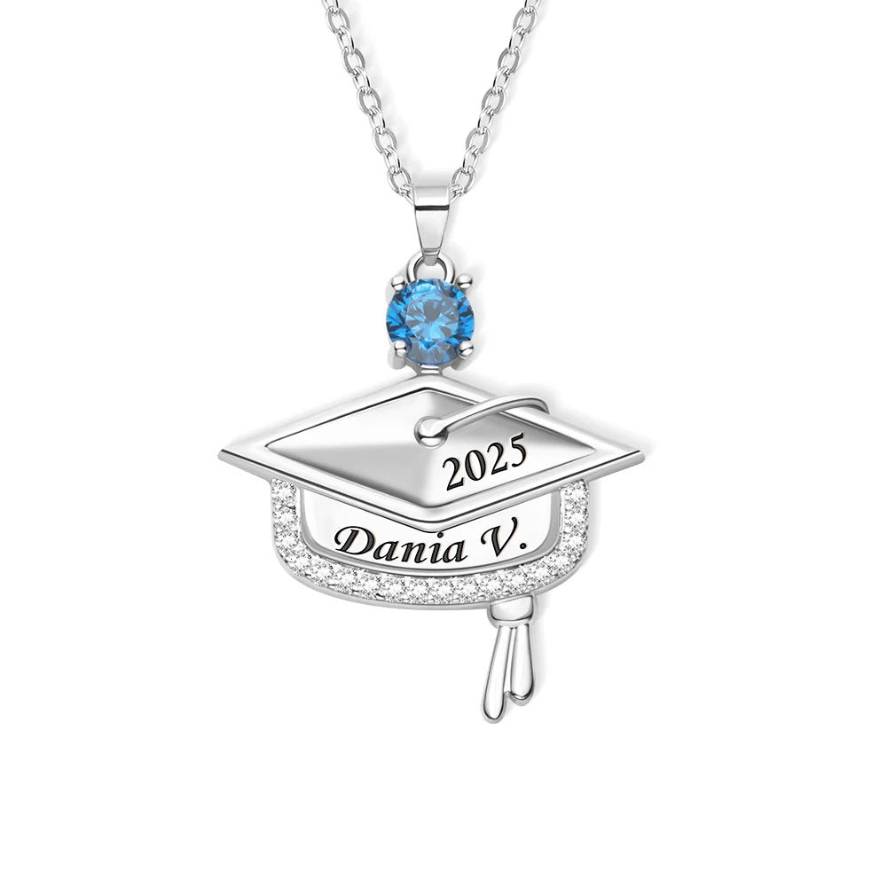 Silver plated solid brass graduation mortarboard pendant with blue cubic zirconia stone studio shot