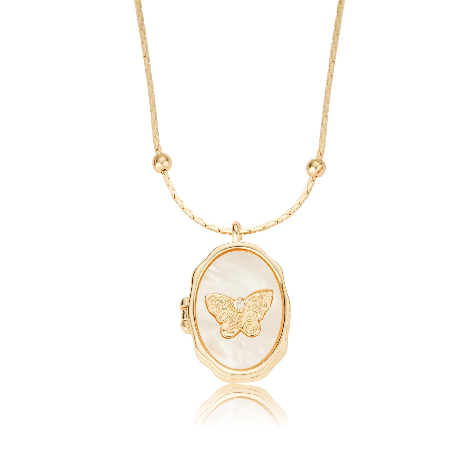 Single oval open photo locket crafted from gold plated brass with natural shell butterfly inlay on plain white backdrop