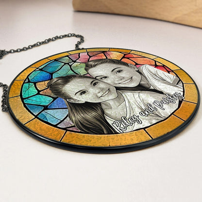 Side close up of custom stained glass photo suncatcher, transparent acrylic window hanging decor with metal chain