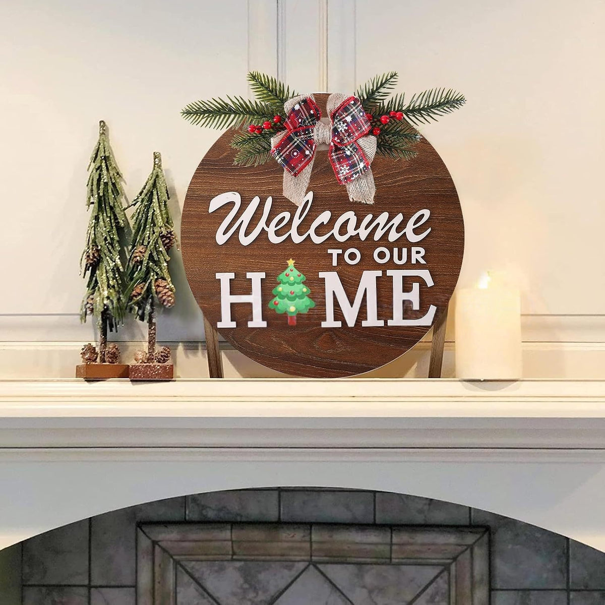 Rustic welcome to our home round wooden sign hanging on fireplace mantel, farmhouse indoor seasonal home decoration with Christmas bow
