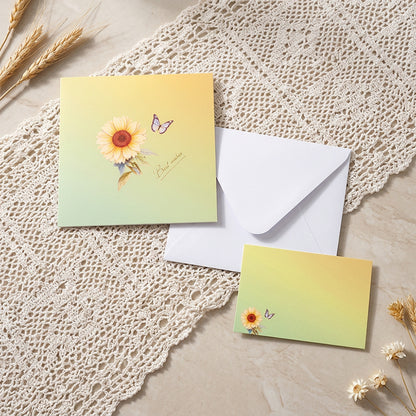 Floral pop up card set with white envelope and blank message note flat lay